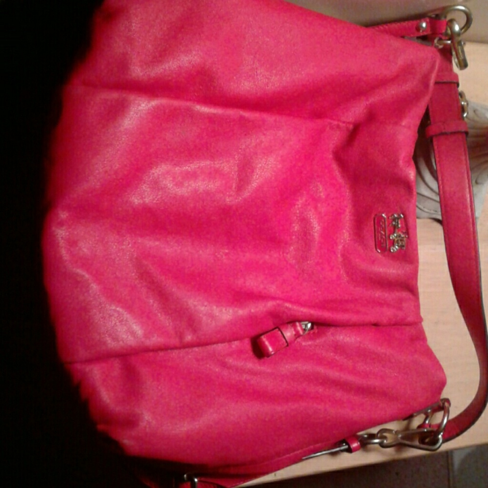 Coach purse shoulder bag pink in color